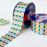 Mod Petal Retro printed satin ribbon roll, pink, orange and teal petal flowers in a geometric grid on cream with a white back, 1.5 inch (38 mm) – Littl