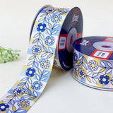 Scandi Bloom Retro printed satin ribbon roll, blue flowers and leaf sprigs in pastel tiles with a white back, 1.5 inch (38 mm) – Littl