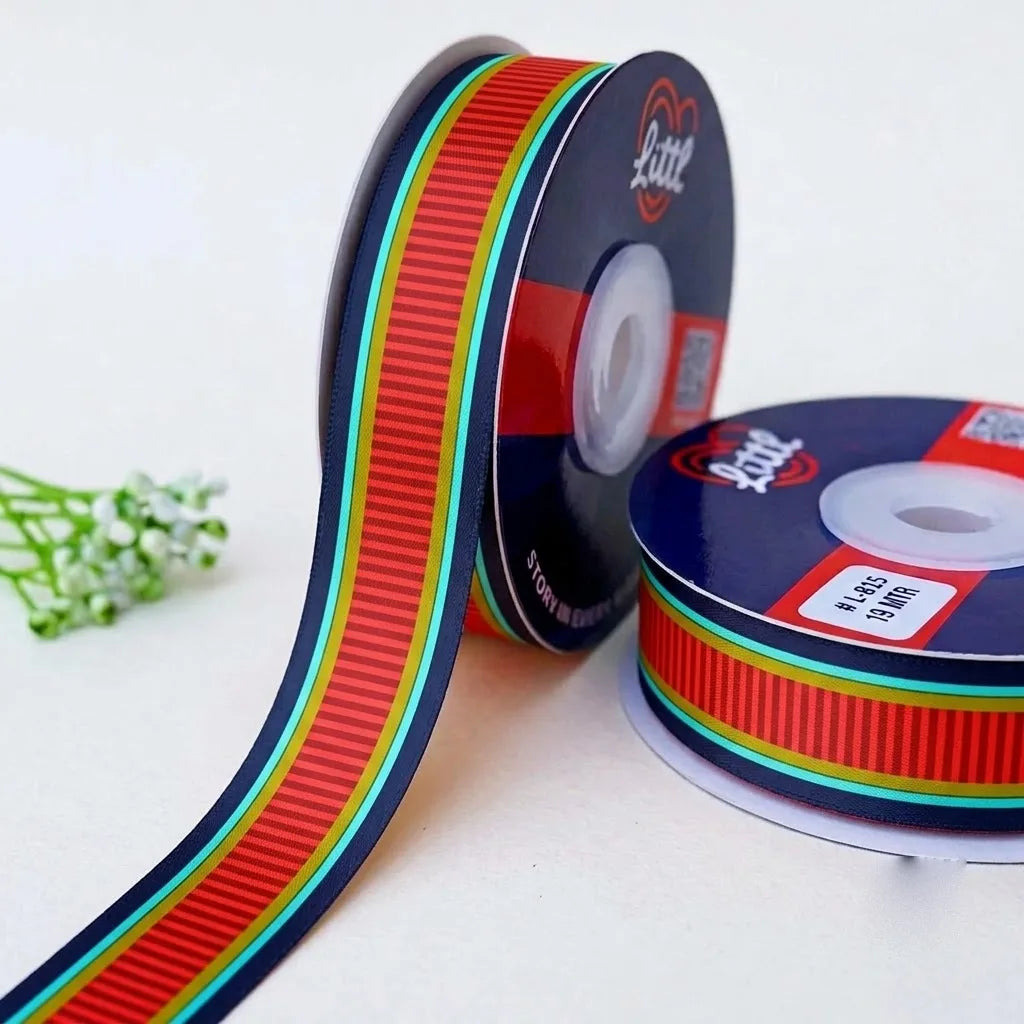Carnival Stripe Retro printed satin ribbon roll, a red pinstripe band edged in turquoise, green and navy with a white back, 1 inch (25 mm) – Littl