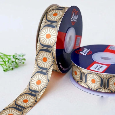 Daisy Tile Retro printed satin ribbon roll, white daisies with orange centres in navy-outlined tiles on beige with a white back, 1 inch (25 mm) – Littl