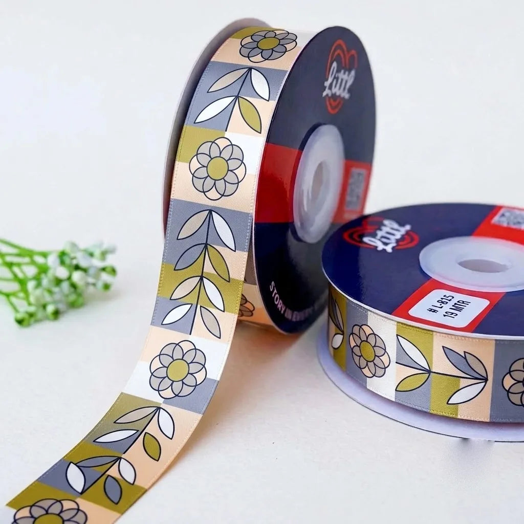 Scandi Bloom Retro printed satin ribbon roll, grey and olive flowers and leaf sprigs in pastel tiles on peach and grey with a white back, 1 inch (25 mm) – Littl