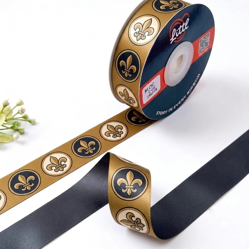 Fleur-de-Lis French printed satin ribbon roll, black and gold fleur-de-lis medallions on bronze gold with a solid charcoal black back, 1 inch (25 mm) – Littl