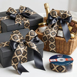 Gift wrapped with Damask Tile French printed ribbon from Littl