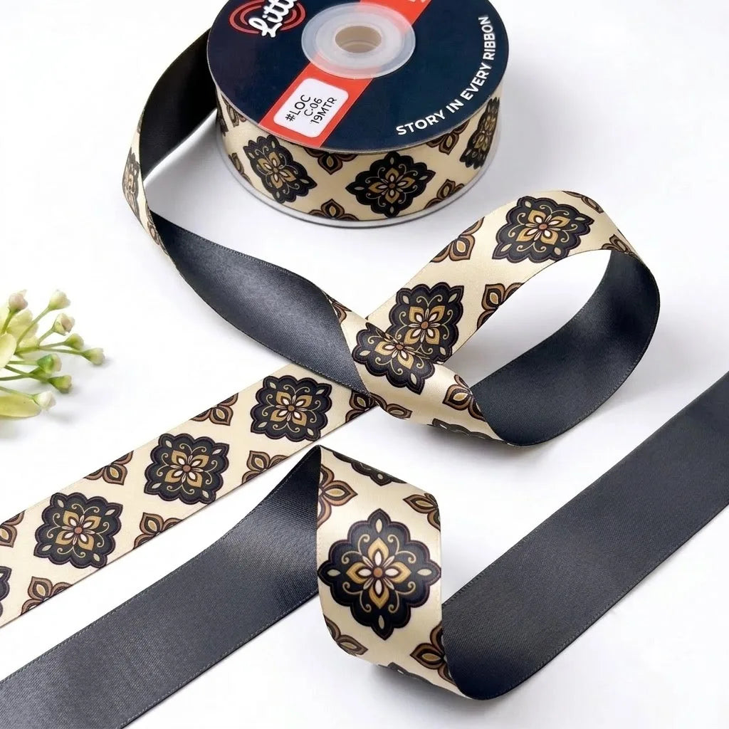 Damask Tile ribbon twisted to show the printed front and solid charcoal black back