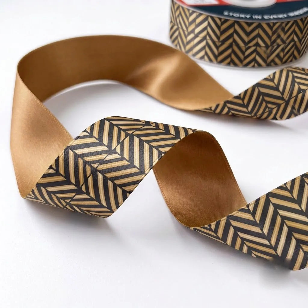 Close-up of Gold Herringbone ribbon: a gold herringbone chevron printed on black satin