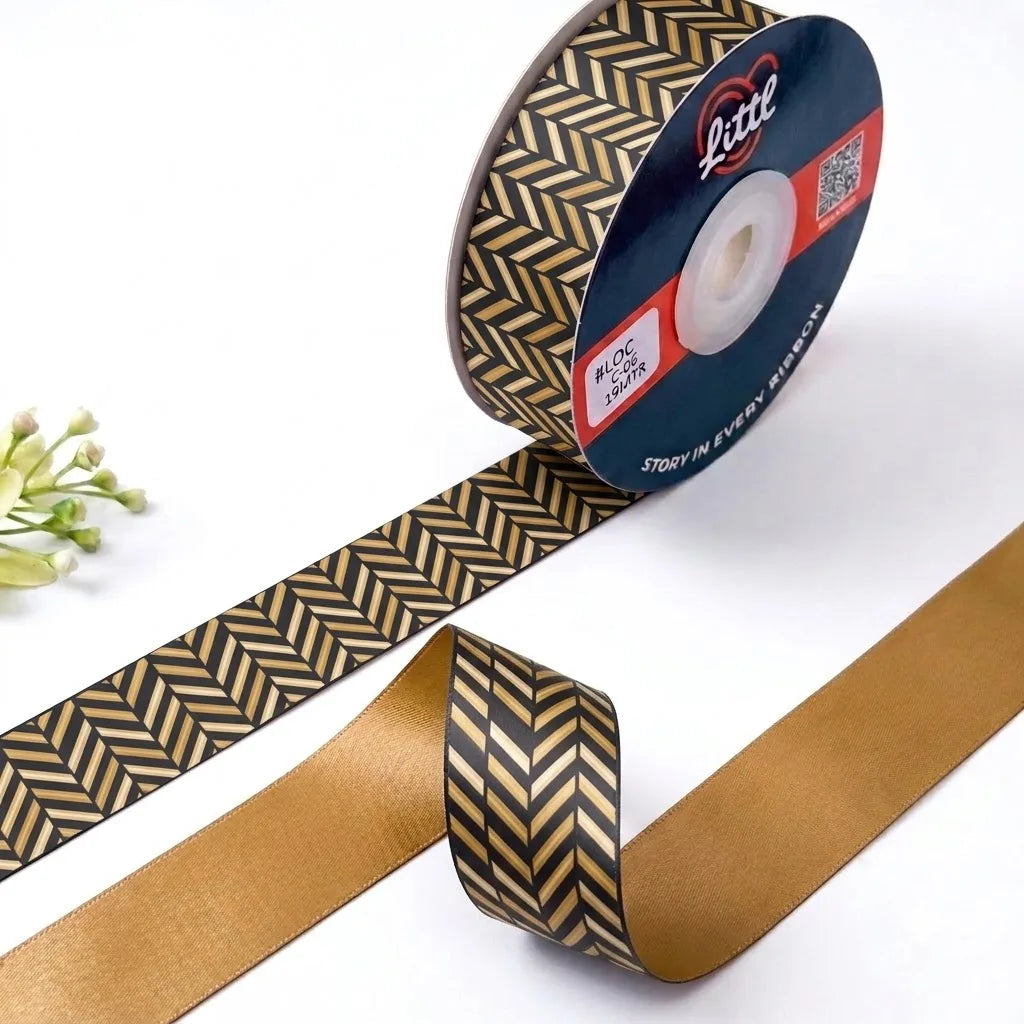 Gold Herringbone Art Deco printed satin ribbon roll, a gold herringbone chevron on black with a solid antique gold back, 1 inch (25 mm) – Littl