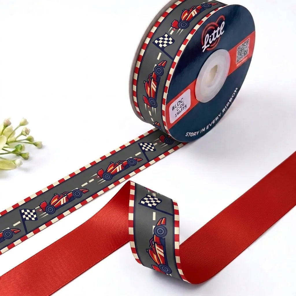 Race Day Kids printed satin ribbon roll, race cars and chequered flags on a charcoal grey racetrack with a solid racing red back, 1 inch (25 mm) – Littl