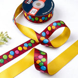 Balloon Party ribbon twisted to show the printed front and solid sunny yellow back