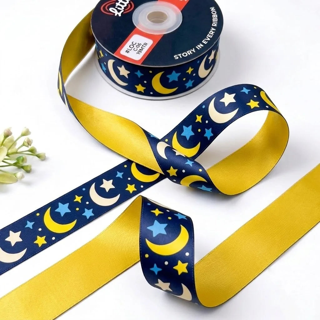 Moon & Stars ribbon twisted to show the printed front and solid golden yellow back