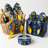 Gift wrapped with Moon & Stars Kids printed ribbon from Littl