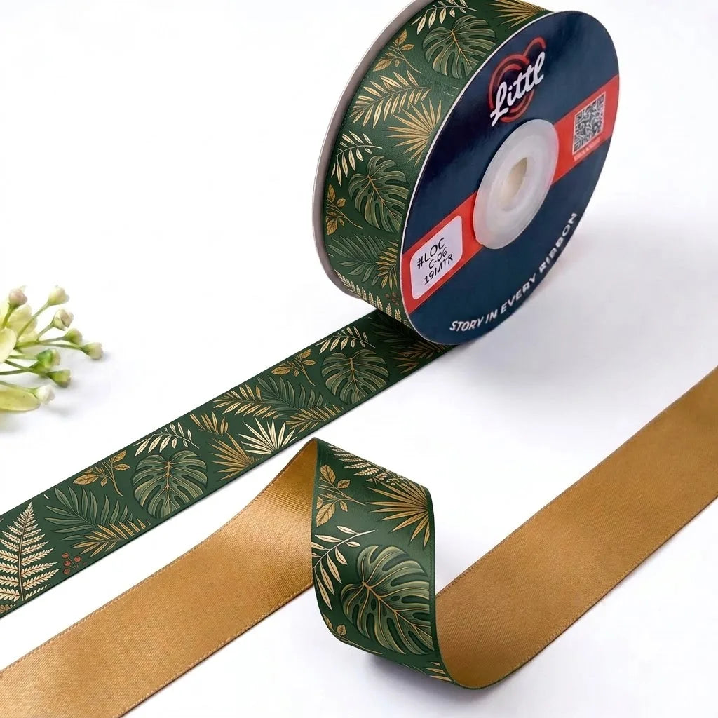 Palm House Botanical printed satin ribbon roll, gold-lined palm and monstera leaves on forest green with a solid antique gold back, 1 inch (25 mm) – Littl