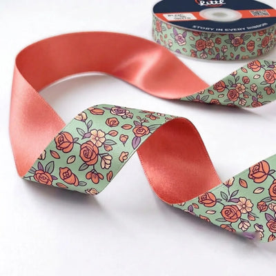 Close-up of Rose Ditsy ribbon: small pink roses printed on mint green satin