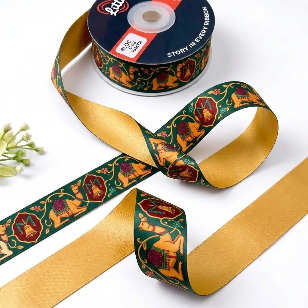 Camel Darbar ribbon twisted to show the printed front and solid mustard gold back