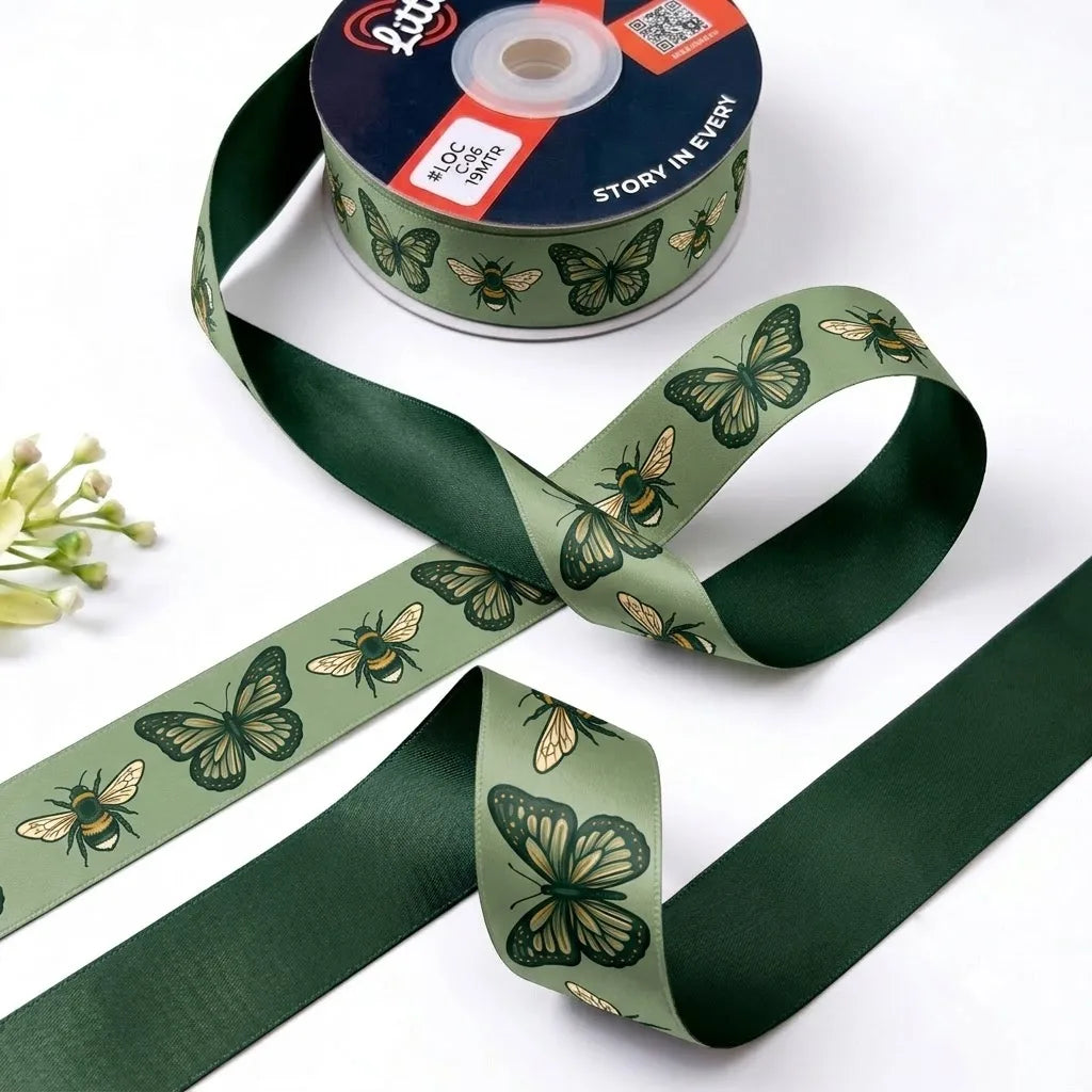 Butterfly & Bee ribbon twisted to show the printed front and solid forest green back