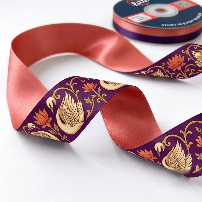 Close-up of Hamsa Lotus ribbon: golden swans (hamsa) and lotus flowers printed on plum purple satin