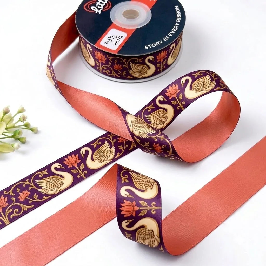 Hamsa Lotus ribbon twisted to show the printed front and solid coral peach back
