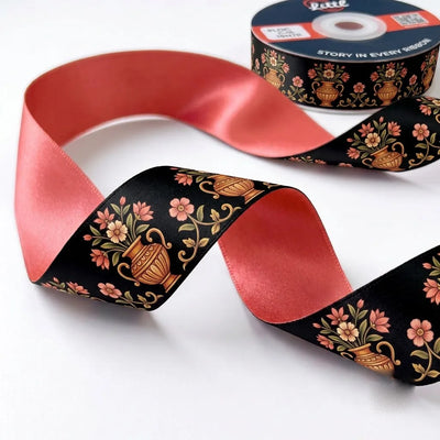 Close-up of Kalash Bloom ribbon: flower-filled kalash vases printed on black satin