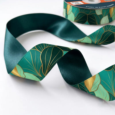 Close-up of Ginkgo Jade ribbon: jade and gold ginkgo leaves printed on teal satin