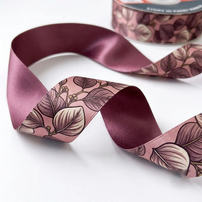 Close-up of Mauve Leaf ribbon: sketched mauve leaves printed on dusty pink satin
