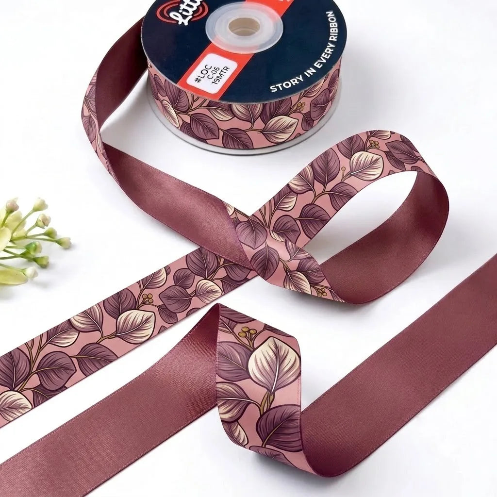 Mauve Leaf ribbon twisted to show the printed front and solid old rose back