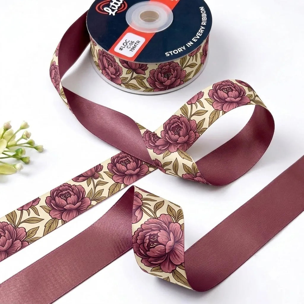 Jewel Toran ribbon twisted to show the printed front and solid wine back