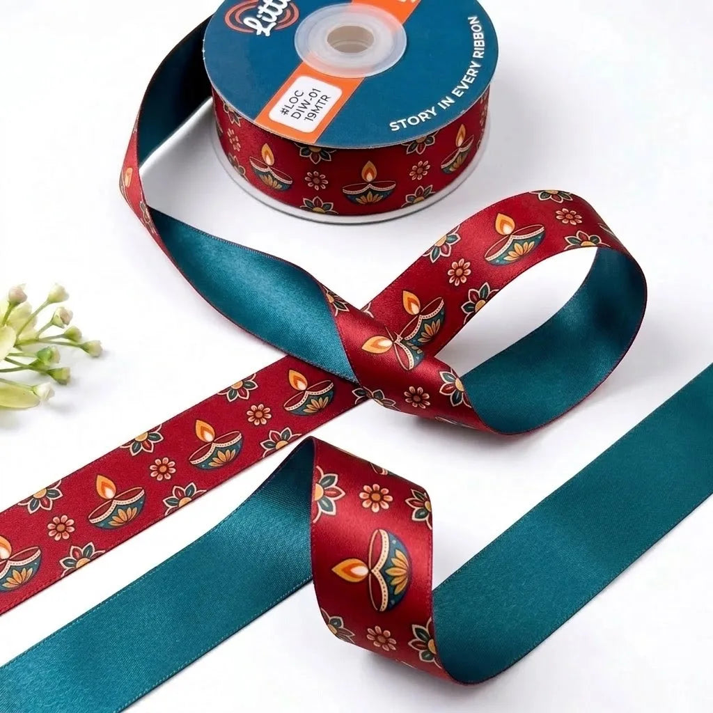 Diya Glow ribbon twisted to show the printed front and solid teal back