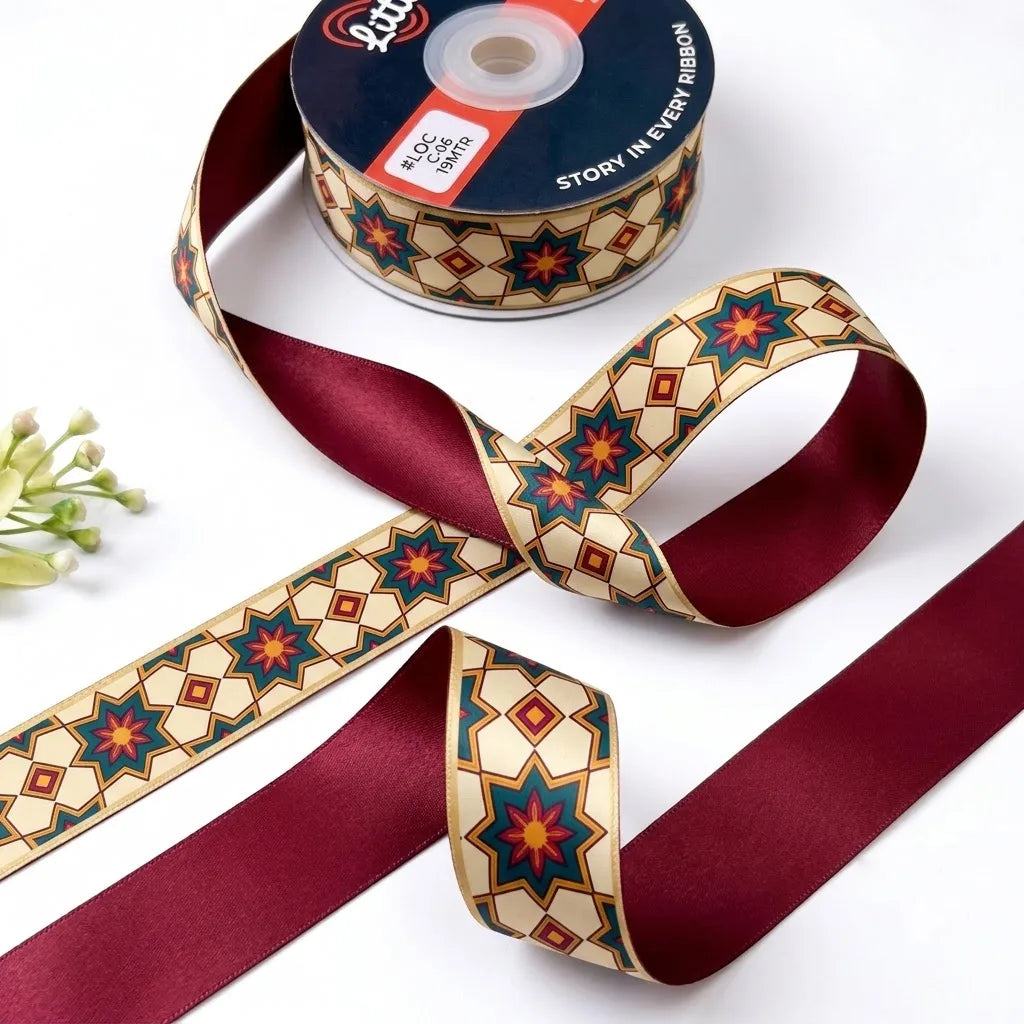 Kandil Star ribbon twisted to show the printed front and solid maroon back