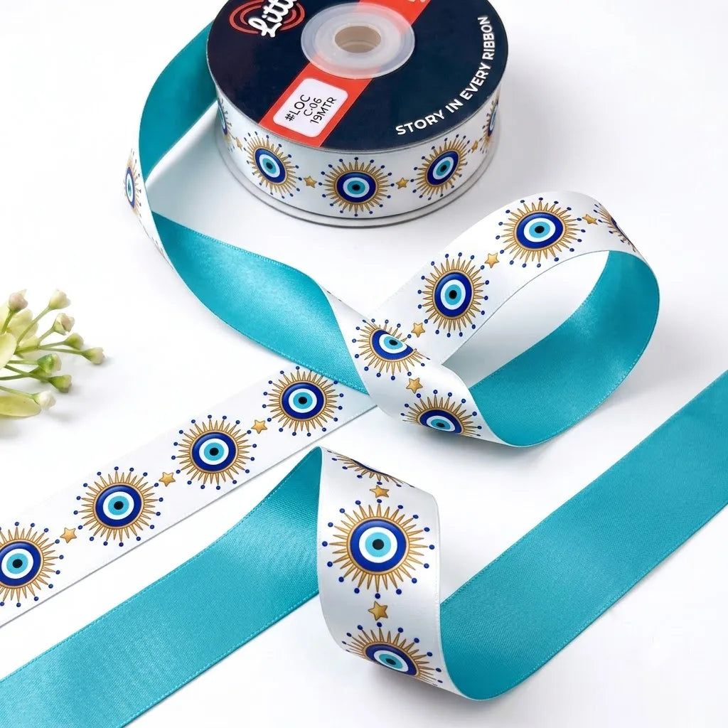 Nazar Sun ribbon twisted to show the printed front and solid turquoise back