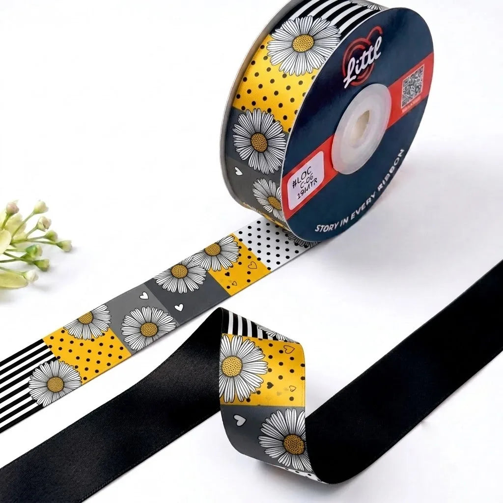 Daisy Patchwork Retro printed satin ribbon roll, white daisies on a patchwork of stripes and polka dots on black, grey and yellow with a solid black back, 1 inch (25 mm) – Littl