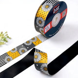 Daisy Patchwork Retro printed satin ribbon roll, white daisies on a patchwork of stripes and polka dots on black, grey and yellow with a solid black back, 1 inch (25 mm) – Littl